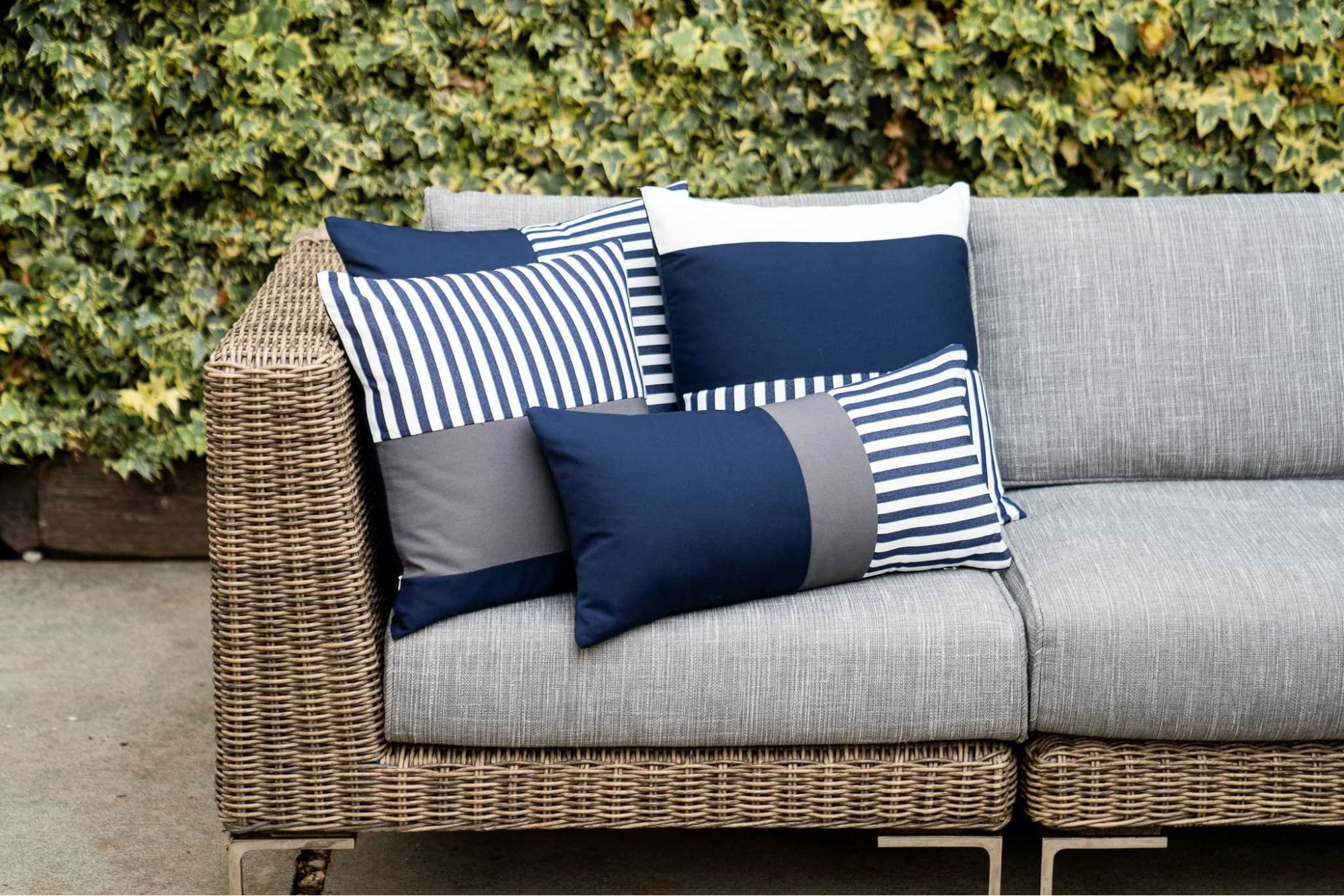 outdoor cushions on a wicker couch